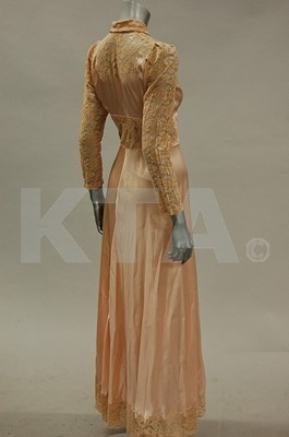 Lot 84 - An early 1930s pink satin negligee, together...