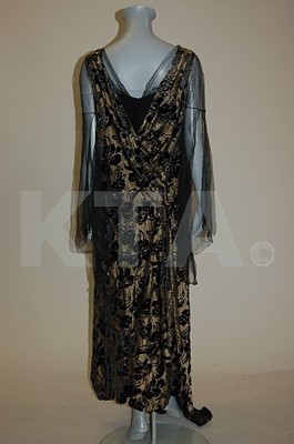 Lot 89 - Two 1930s evening gowns, the first of blue...