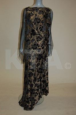Lot 89 - Two 1930s evening gowns, the first of blue...