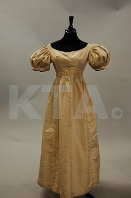 Lot 92 - An oyster taffeta gown, mid 1820s, together...