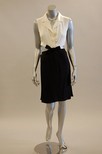 Lot 208 - A Chanel ivory and black silk cocktail dress,...