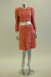 Lot 215 - A Chanel red and white boucltweed suit, 1990s,...