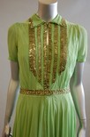 Lot 60 - A Paquin couture apple-green chiffon evening...