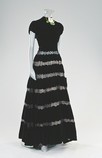 Lot 57 - A rare Lucien Lelong couture black lace and...
