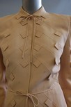 Lot 66 - An Adrian suit, circa 1947, labelled and also...