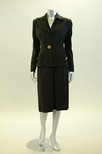 Lot 67 - An Adrian black wool lady's suit, 1940s,...