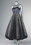 Lot 91 - A Jean Desss couture navy chantilly dance...