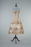 Lot 89 - A Jacques Fath evening gown, circa 1955,...