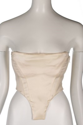 Lot 182 - A rare John Galliano ivory satin corset-bodice,...