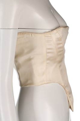 Lot 182 - A rare John Galliano ivory satin corset-bodice,...