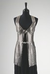 Lot 122 - A Paco Rabanne metal tunic, 1968, black paper...