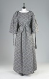 Lot 119 - A pale grey cloqugown and capelet possibly...