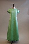 Lot 129 - An Yves Saint Laurent boutique mint green...