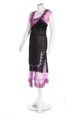 Lot 176 - A Comme des Garçons purple and black nylon...