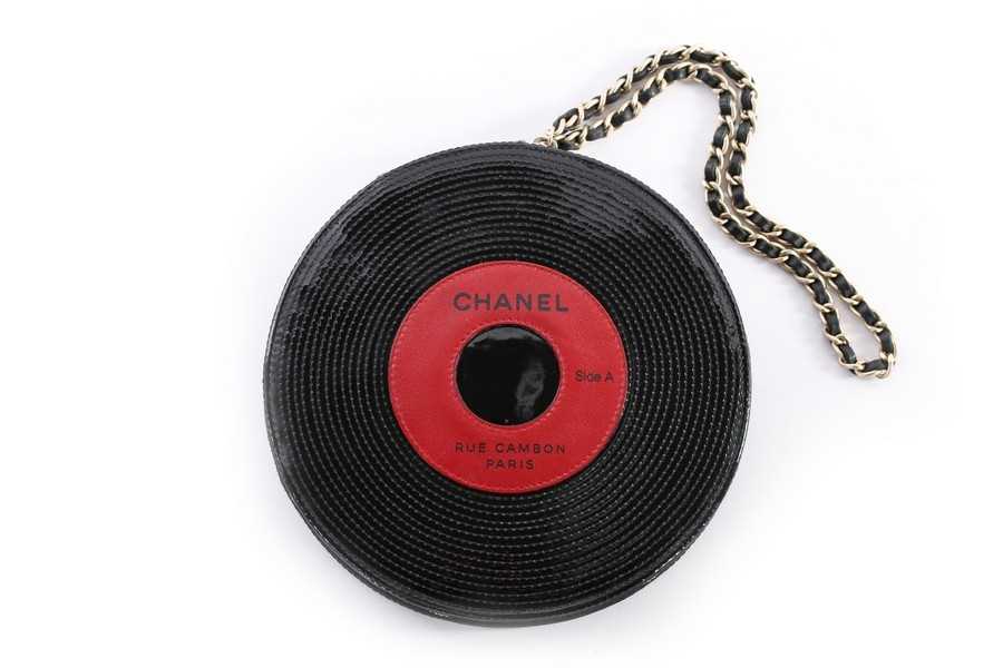 Lot 1 - A Chanel patent leather 'vinyl record' bag,...