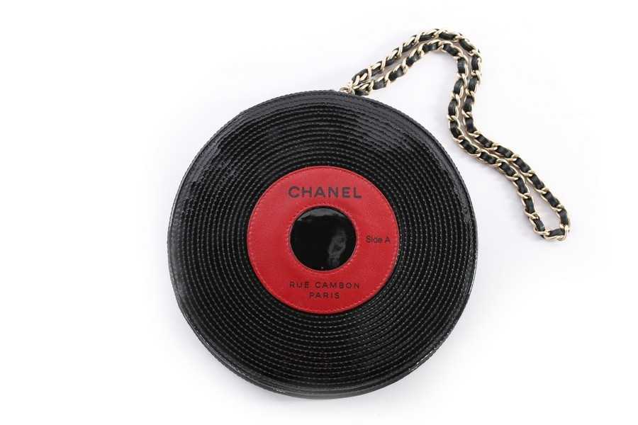 Click for high resolution Lot 1 - A Chanel patent leather 'vinyl record' bag,...