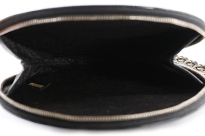 Lot 1 - A Chanel patent leather 'vinyl record' bag,...