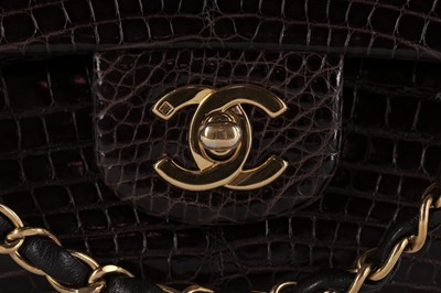 Lot 8 - A Chanel brown polished alligator double-flap...