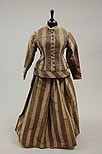 Lot 156 - A striped brown moire gown, 1870s, with later...