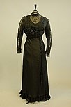 Lot 177 - A group of black evening/mourning wear,...