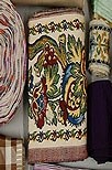 Lot 188 - Three boxes of ribbons, braids, sequins, and...
