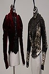 Lot 213 - A group of bodices, jackets, capes and skirts,...