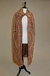 Lot 31 - A cape formed from a `Paisley' wool shawl, the...