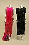 Lot 231 - A fuchsia velvet beaded evening gown, early...