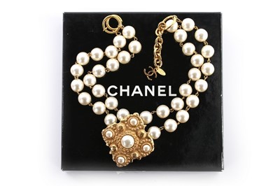Lot 9 - A Chanel pearl beaded choker necklace, 1983,...