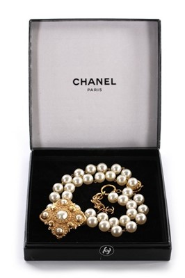 Lot 9 - A Chanel pearl beaded choker necklace, 1983,...