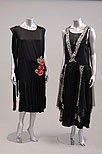 Lot 245 - Four black cocktail dresses, 1920s, including...
