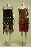 Lot 247 - 1920s cocktail wear, comprising; black satin...