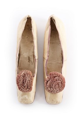 Lot 220 - Empress Eugenie's ivory leather pumps, 1860s,...