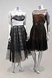 Lot 317 - Eight 1950s dance dresses, mainly grey, beige...