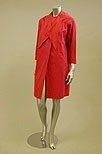 Lot 321 - A Schiaparelli raspberry pink raincoat, late...