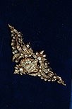 Lot 337 - A diamond stomacher brooch, probably late 19th...
