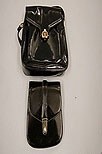 Lot 67 - Two patent leather Gucci handbags, late...