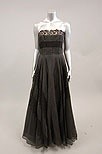 Lot 71 - A mid-1950's black organza ball gown, with...