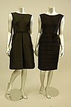 Lot 73 - Two black dinner dresses, circa 1969, one with...