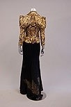 Lot 79 - An Alexander McQueen black and gold damask...