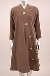 Lot 99 - A Jacques Fath brown brushed wool swing coat,...