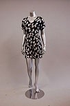 Lot 111 - Two printed cotton playsuits, 1940s, together...
