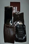 Lot 117 - Five leather clutch bags, 1930s-40s, including...
