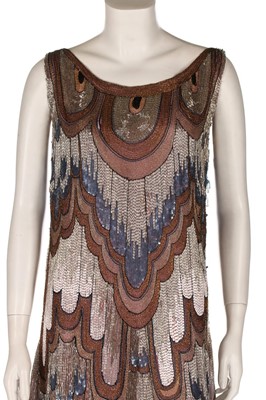 Lot 49 - A Jeanne Lanvin couture beaded chiffon dress,...