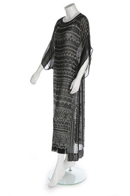 Lot 55 - An embroidered georgette evening gown, circa...
