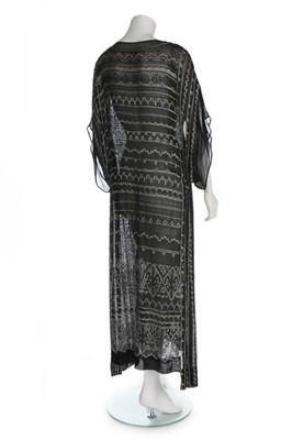 Lot 55 - An embroidered georgette evening gown, circa...