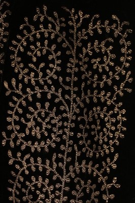 Lot 47 - A Mariano Fortuny stencilled brown velvet...