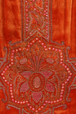 Lot 57 - An embroidered brick-red velvet couture...