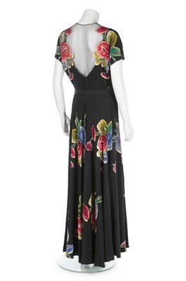 Lot 74 - A Nina Ricci couture floral silk evening dress,...