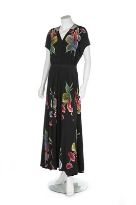 Lot 74 - A Nina Ricci couture floral silk evening dress,...